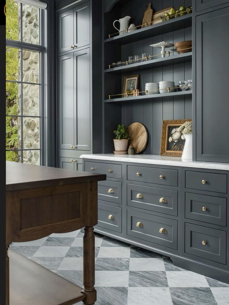 navy cabinets with checkered floor