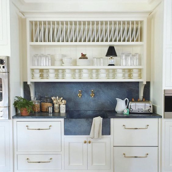 white kitchen cabinets with blue counters